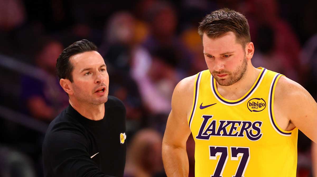 Lakers guard Luka Doncic (77) with head coach JJ Redick