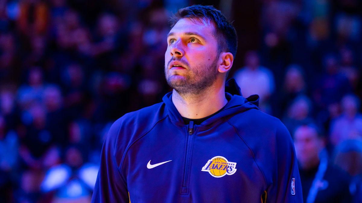 Los Angeles Lakers guard Luka Doncic (77) against the Phoenix Suns during an NBA preseason game at Mortgage Matchup Center.