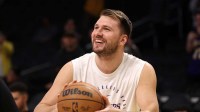 Los Angeles Lakers guard Luka Doncic (77) warms up before game against Houston Rockets