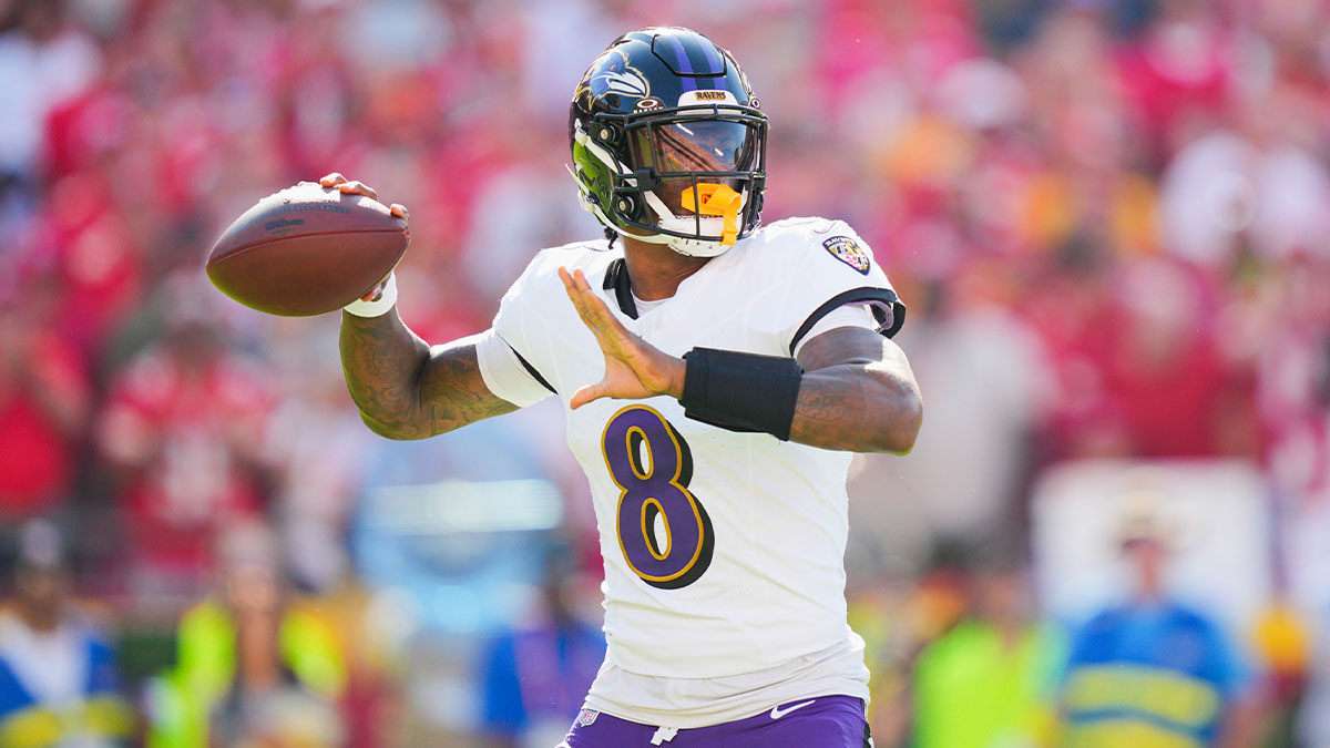 Baltimore Ravens quarterback Lamar Jackson (8) throws a pass during the first half against the Kansas City Chiefs at GEHA Field at Arrowhead Stadium. 