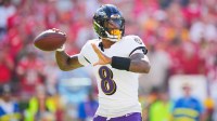 Baltimore Ravens quarterback Lamar Jackson (8) throws a pass during the first half against the Kansas City Chiefs at GEHA Field at Arrowhead Stadium.