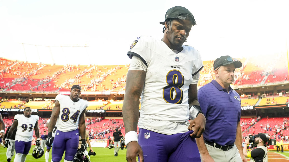 Baltimore Ravens quarterback Lamar Jackson (8) leaves the field after a game against the Kansas City Chiefs at GEHA Field at Arrowhead Stadium.