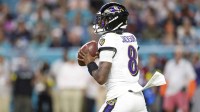 Baltimore Ravens quarterback Lamar Jackson (8) looks to pass against the Miami Dolphins in the second quarter at Hard Rock Stadium.