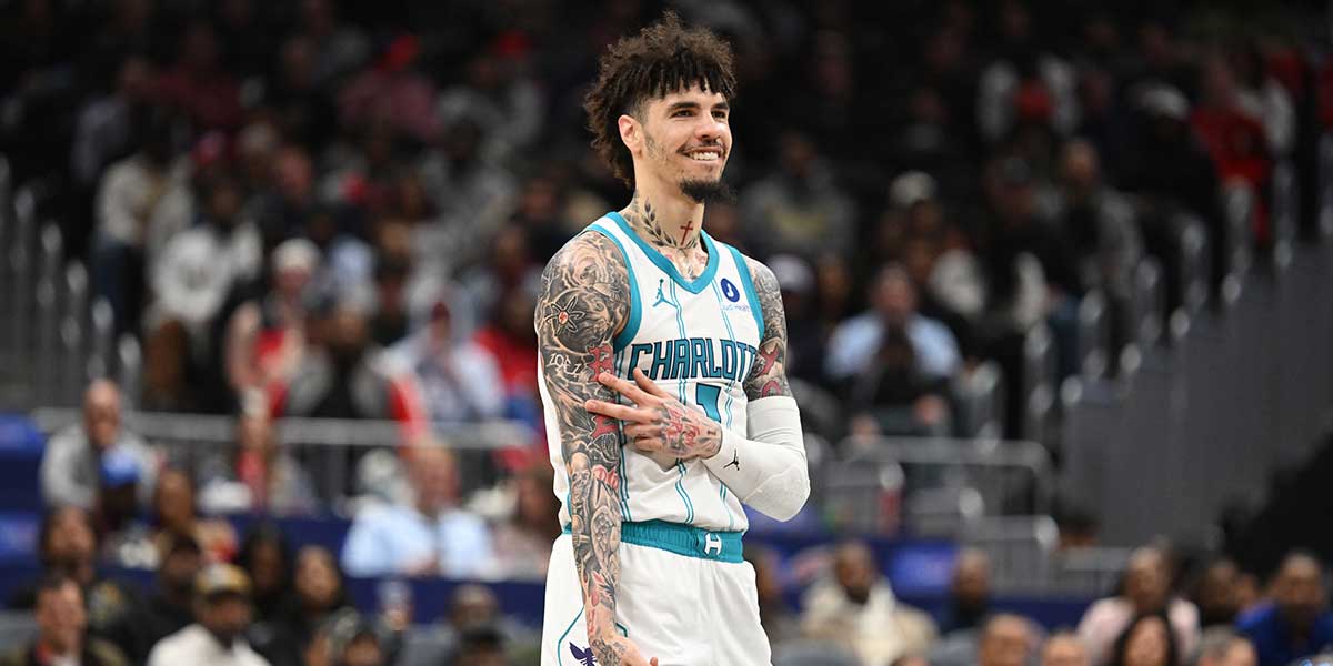 Charlotte Hornets guard LaMelo Ball (1) reacts after making a three point basket against the Washington Wizards during the third quarter at Capital One Arena.
