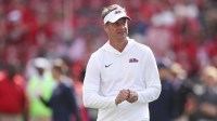 Mississippi Rebels head coach Lane Kiffin prior to the game against the Georgia Bulldogs at Sanford Stadium.