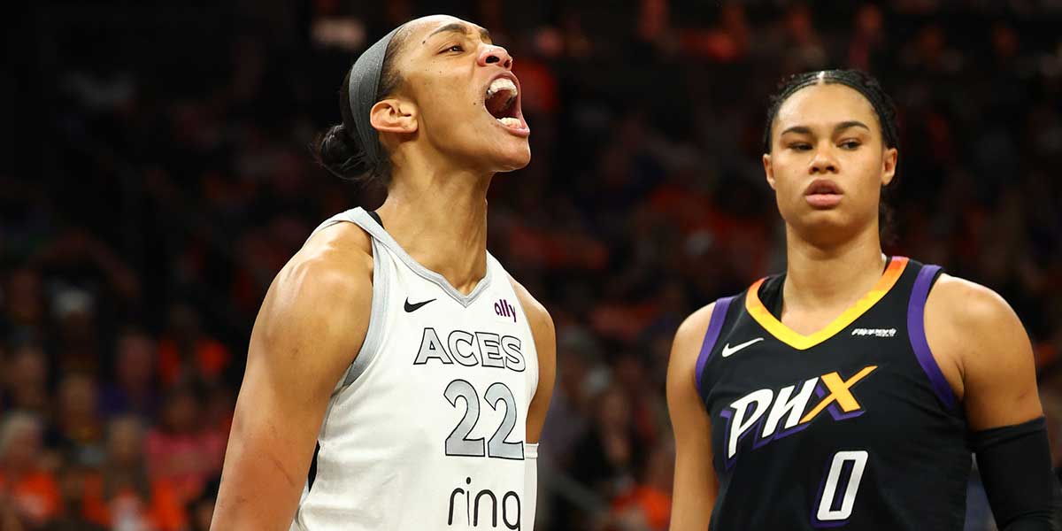 Las Vegas Aces center A'ja Wilson (22) reacts against the Phoenix Mercury in the first half during game three of the 2025 WNBA Finals at PHX Arena.