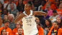 Las Vegas Aces guard Jewell Loyd (24) reacts after a three point basket against the Phoenix Mercury in the first half during game three of the 2025 WNBA Finals at PHX Arena.