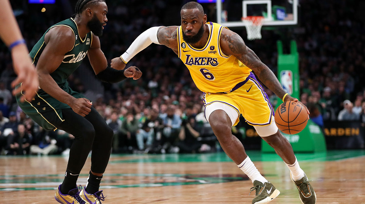 Los Angeles Lakers forward LeBron James (6) drives to the basket defended by Boston Celtics forward Jaylen Brown (7) during the second half at TD Garden.