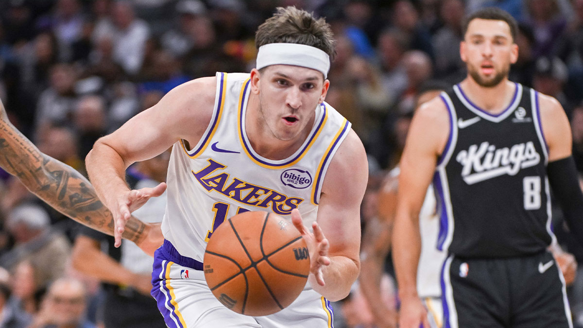 Los Angeles Lakers guard Austin Reaves (15) drives to the basket during the second quarter against the Sacramento Kings at Golden 1 Center.