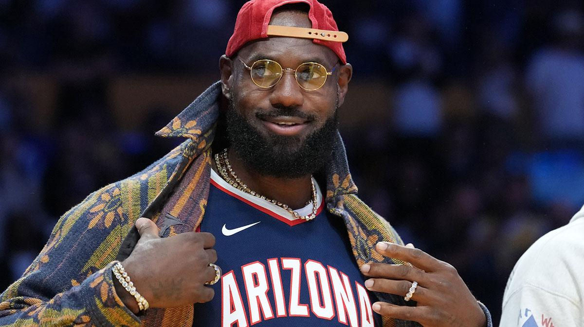 Los Angeles Lakers forward LeBron James poses in the Arizona Wildcats jersey of his son Bryce James (6) during the game against the Minnesota Timberwolves at Crypto.com Arena.