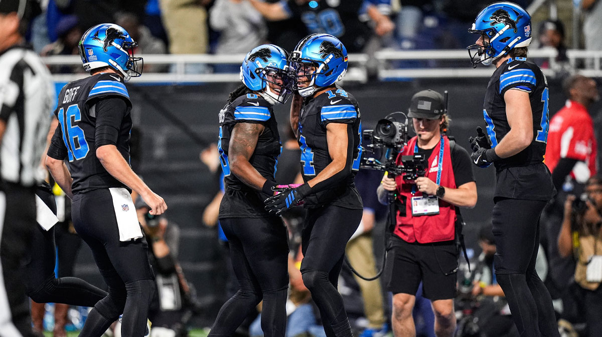 Detroit Lions wide receiver Amon-Ra St. Brown (14) celebrates a touchdown against Tampa Bay Buccaneers with running back Jahmyr Gibbs (0) during the first half at Ford Field in Detroit on Monday, Oct. 20, 2025.