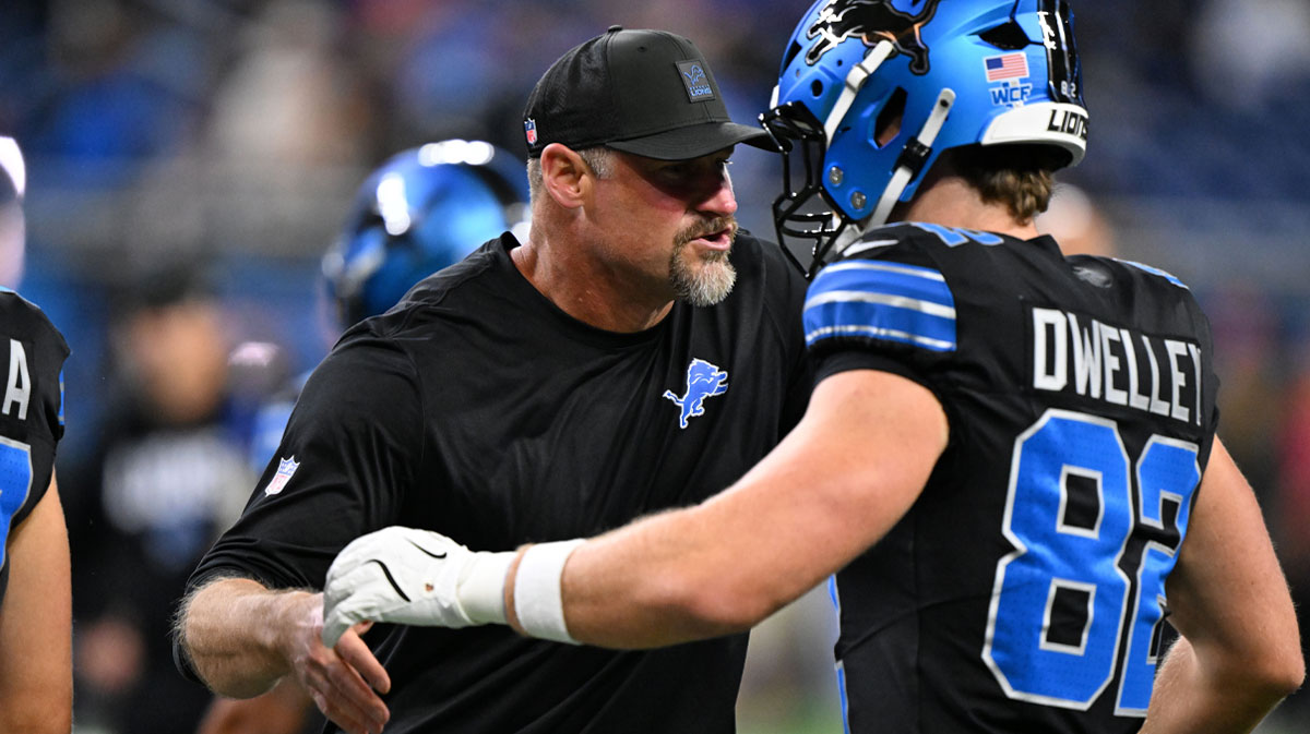 Detroit Lions head coach Dan Campbell reacts with tight end Ross Dwelley (82) before the game aTampa Bay Buccaneers at Ford Field.