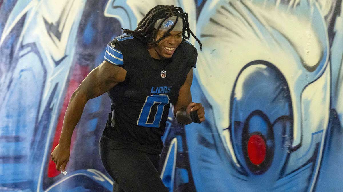 Detroit Lions running back Jahmyr Gibbs (0) walks back to the locker room after the game against the Tampa Bay Buccaneers at Ford Field.