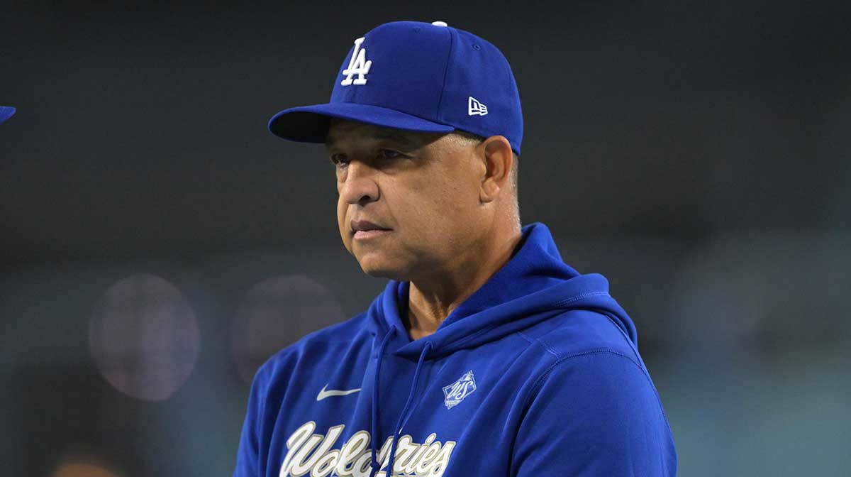 ; Los Angeles Dodgers manager Dave Roberts (30) looks on during World Series workouts prior to game three against the Toronto Blue Jays at Dodger Stadium.