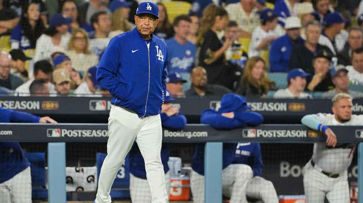 Los Angeles Dodgers manager Dave Roberts (30) makes a pitching change during the fifth inning against the Philadelphia Phillies during game three of the NLDS round for the 2025 MLB playoffs at Dodger Stadium.