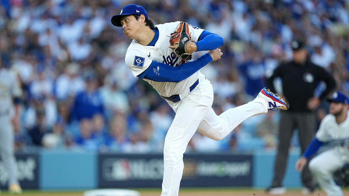 Los Angeles Dodgers two-way player Shohei Ohtani (17) pitches against the Milwaukee Brewers in the first inning during game four of the NLCS round for the 2025 MLB playoffs at Dodger Stadium.
