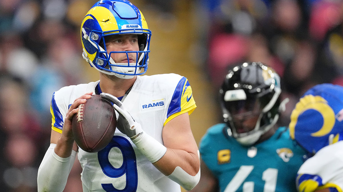Los Angeles Rams quarterback Matthew Stafford (9) looks to pass the ball against the Jacksonville Jaguars during the first half of an NFL International Series game at Wembley Stadium.