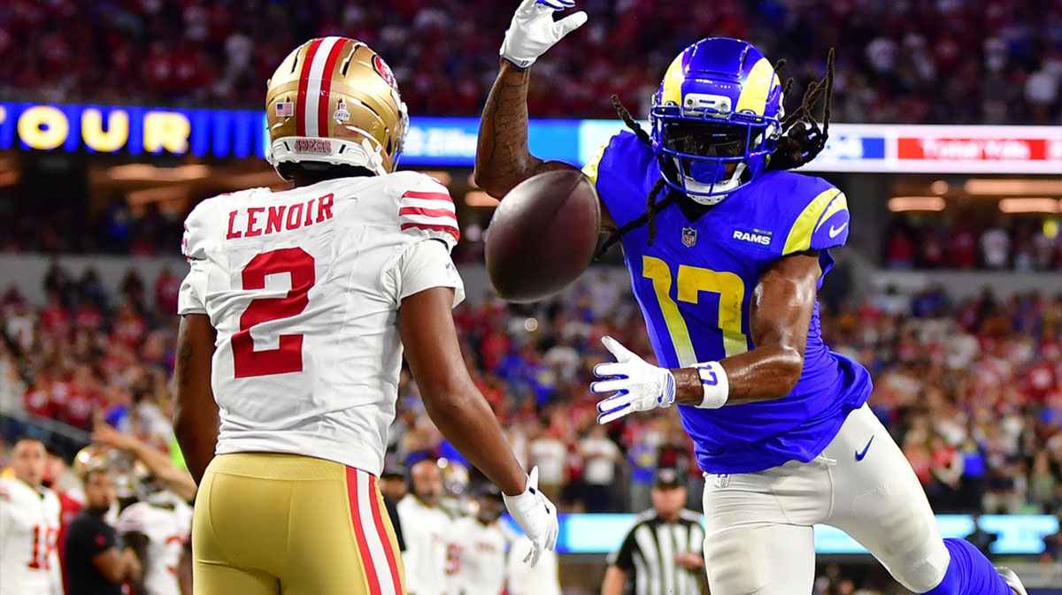 Los Angeles Rams wide receiver Davante Adams (17) attempts to make a catch against San Francisco 49ers cornerback Deommodore Lenoir (2) during the second half at SoFi Stadium