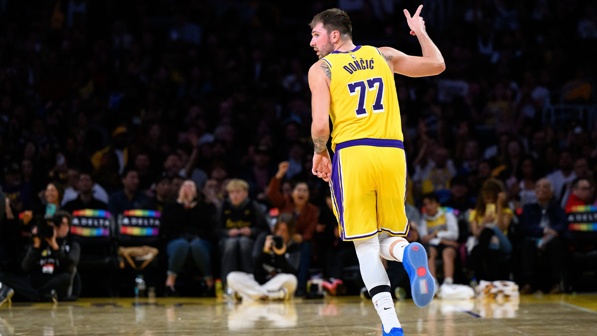 Los Angeles Lakers guard Luka Doncic (77) gestures after scoring during the second half against the Sacramento Kings at Crypto.com Arena.