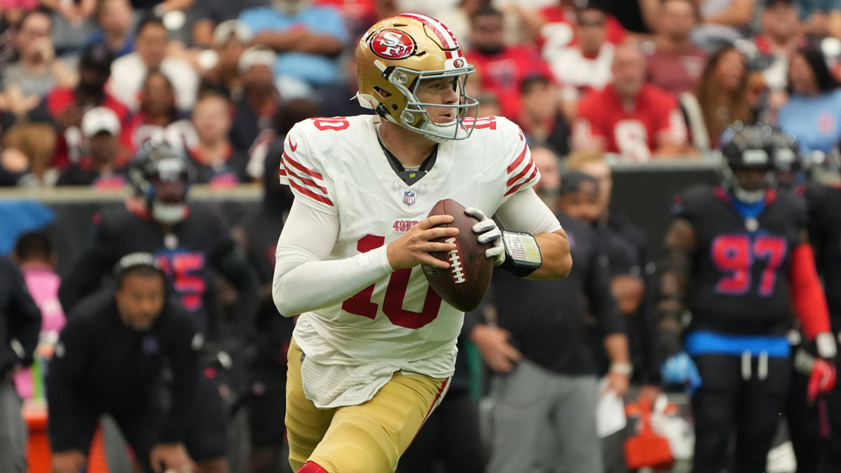 San Francisco 49ers quarterback Mac Jones (10) throws downfield during the first quarter against the Houston Texans at NRG Stadium.