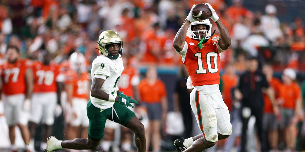 Miami Hurricanes wide receiver Malachi Toney (10) catches a pass against the South Florida Bulls in the third quarter at Hard Rock Stadium.