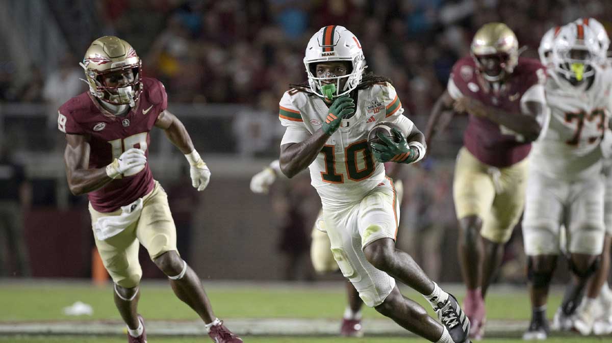 Miami Hurricanes wide receiver Malachi Toney (10) runs against Florida State Seminoles defensive back Jerry Wilson (19) during the second half at Doak S. Campbell Stadium. Mandatory Credit: Melina Myers-Imagn Images