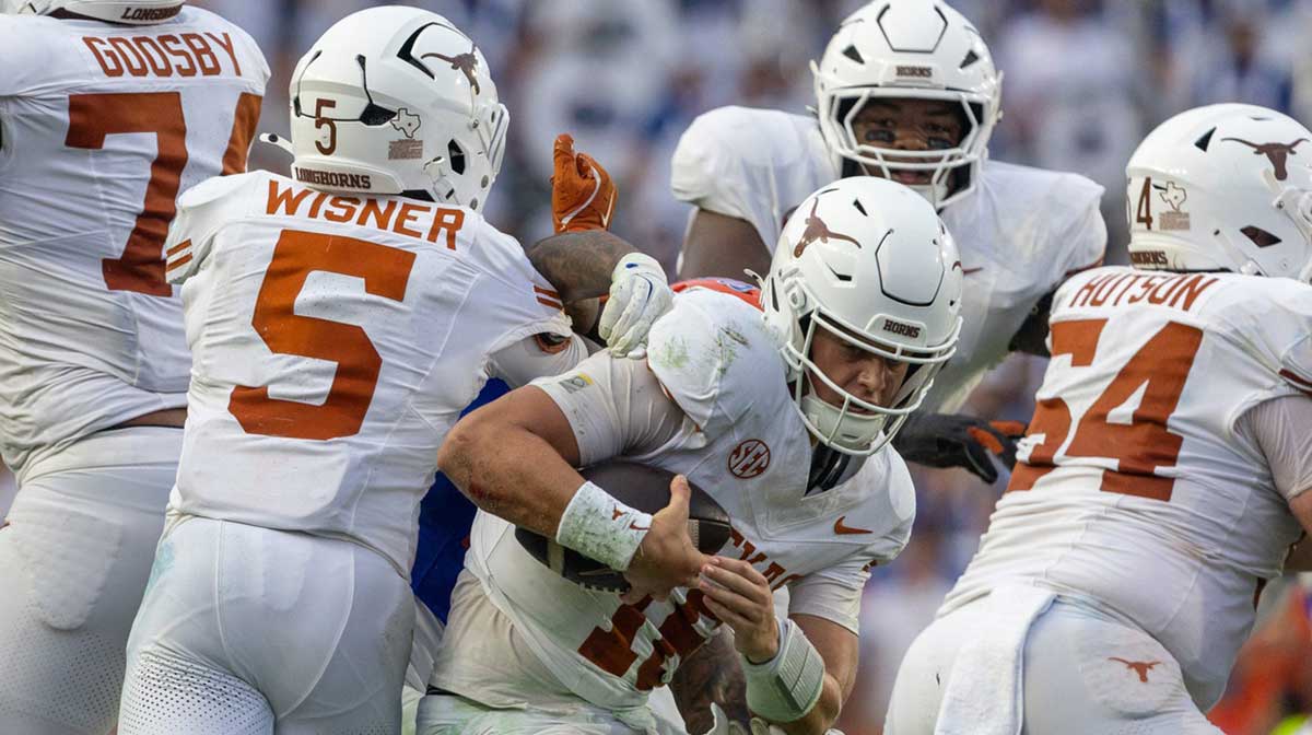 Texas quarterback Arch Manning (16) gets pressure during the second half an NCAA football game in Gainesville, FL on Saturday, October 4, 2025