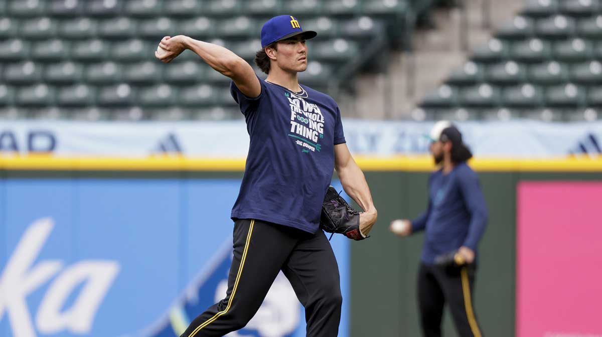 Seattle Mariners starting pitcher Bryan Woo (22) throws in the outfield before a game against the Colorado Rockies at T-Mobile Park.