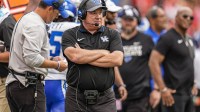 Kentucky Wildcats head coach Mark Stoops shown on the sidelines during the game against the Georgia Bulldogs during the first half at Sanford Stadium.