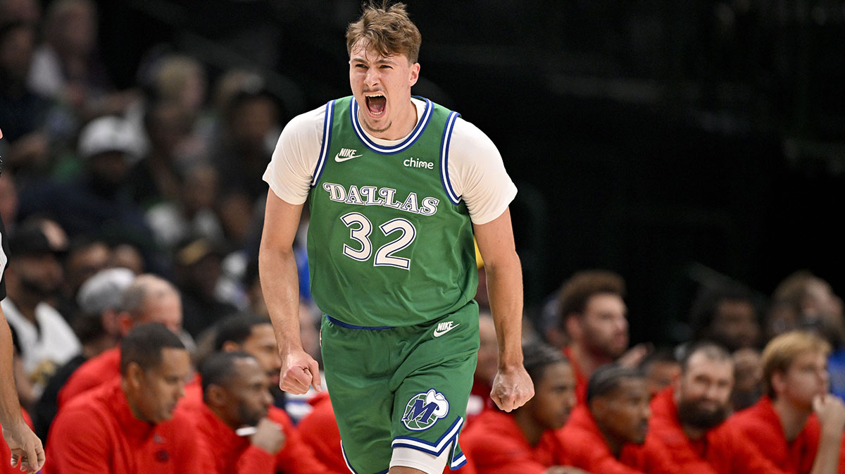 Dallas Mavericks forward Cooper Flagg (32) celebrates during the first quarter against the Toronto Raptors at the American Airlines Center.