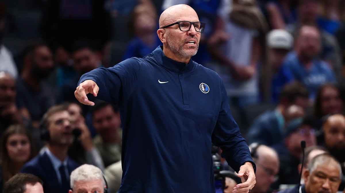 Mavericks head coach Jason Kidd reacts during the second half against the Washington Wizards at American Airlines Center with Luka Doncic who scored 49 points in the background