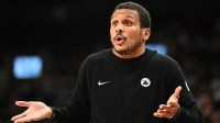 Boston Celtics head coach Joe Mazzulla gestures as he speaks with game officials in the second half against the Toronto Raptors at Scotiabank Arena.
