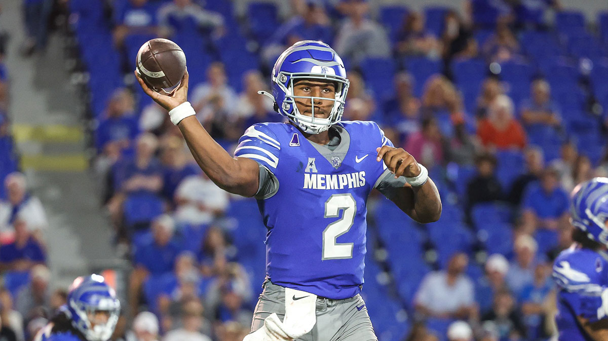 Oct 4, 2025; Memphis, Tennessee, USA; Memphis Tigers quarterback Brendon Lewis (2) looks to pass the ball against the Tulsa Golden Hurricane during the second half at Simmons Bank Liberty Stadium. Mandatory Credit: Wesley Hale-Imagn Images