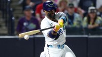 Tampa Bay Rays first baseman Yandy Diaz (2) hits an rbi single against the Boston Red Sox in the seventh inning at George M. Steinbrenner Field.