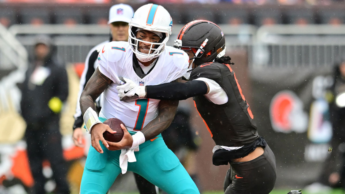 Cleveland Browns safety Grant Delpit (9) sacks Miami Dolphins quarterback Tua Tagovailoa (1) during the first half at Huntington Bank Field.
