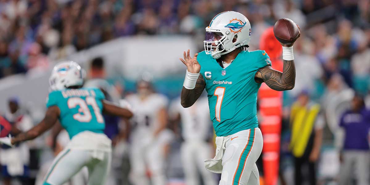 Miami Dolphins quarterback Tua Tagovailoa (1) throws downfield during the second quarter against the Baltimore Ravens at Hard Rock Stadium.
