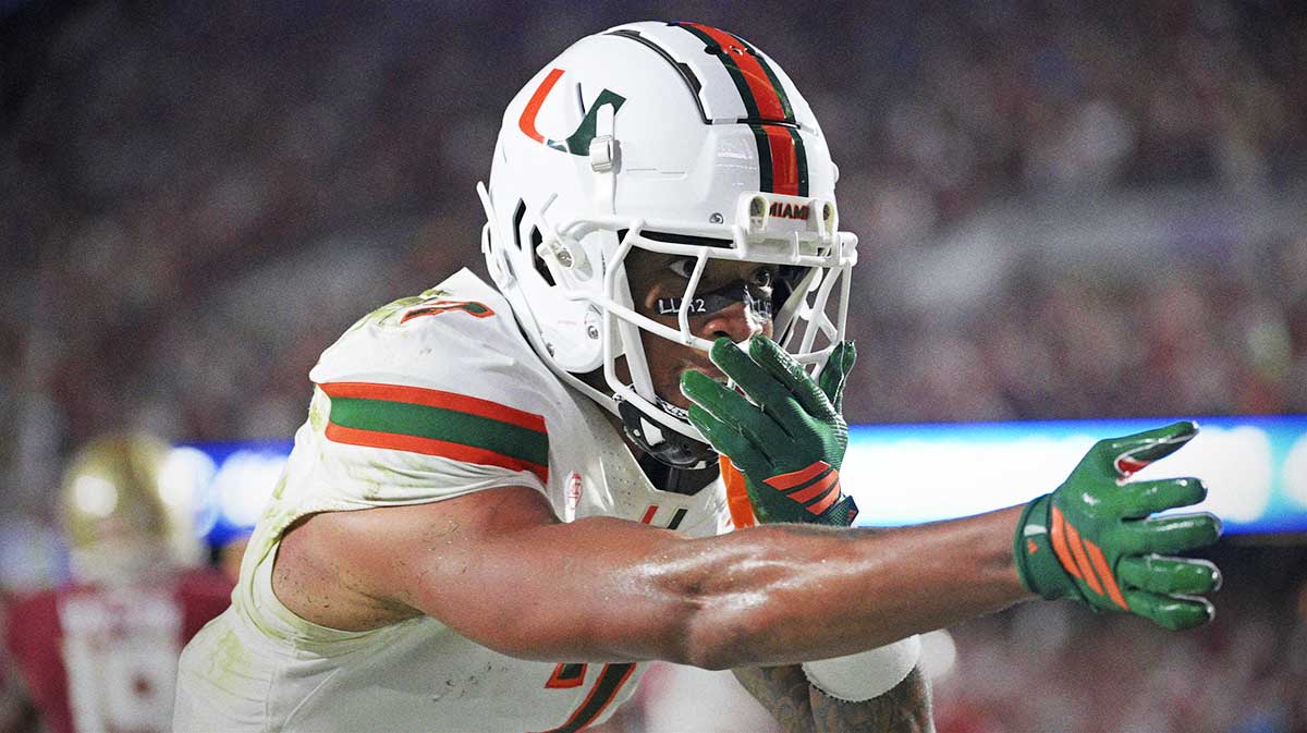 Miami Hurricanes wide receiver CJ Daniels (7) celebrates after a touchdown during the first half against the Florida State Seminoles at Doak S. Campbell Stadium.