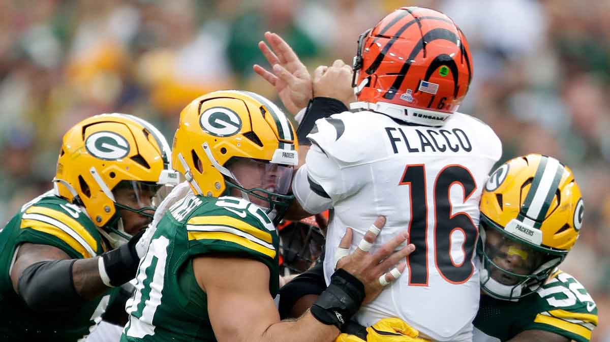 Green Bay Packers defensive end Micah Parsons (1), defensive end Lukas Van Ness (90) and defensive end Rashan Gary (52) pressure Cincinnati Bengals quarterback Joe Flacco (16) on Sunday, October 12, 2025, at Lambeau Field in Green Bay, Wis.Green Bay defeated Cincinnati 27-18