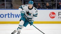 San Jose Sharks center Michael Misa (77) skates against the New York Islanders during the third period at UBS Arena.