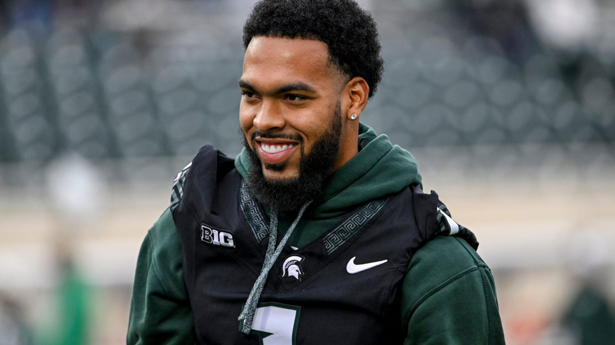 Michigan State's Nikai Martinez smiles while watching the team warm up before the football game against Boston College on Saturday, Sept. 6, 2025, at Spartan Stadium in East Lansing.