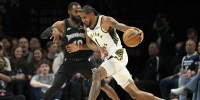 Indiana Pacers forward Obi Toppin (1) dribbles the ball as Minnesota Timberwolves guard Mike Conley (10) plays defense in the first half at Target Center.