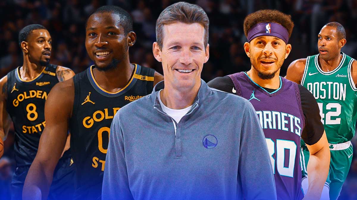 Mike Dunleavy Jr smiling with Jonathan Kuminga, Al Horford, De'Anthony Melton, and Seth Curry happy next to him