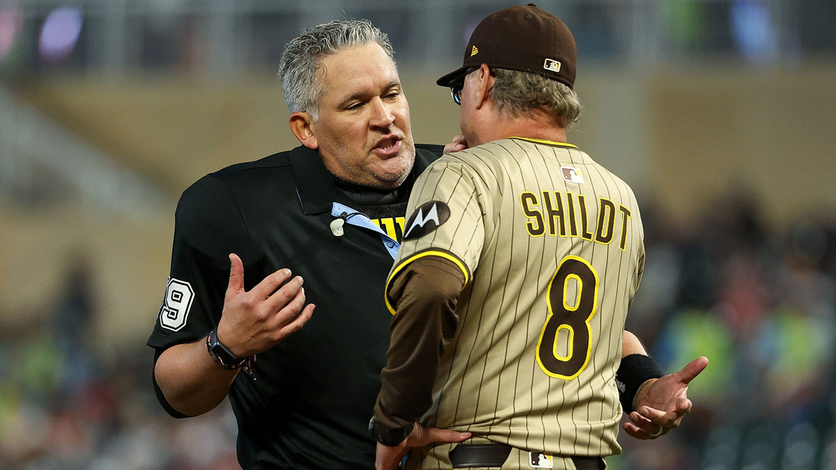 San Diego Padres manager Mike Shildt (8) talks with umpire Manny Gonzalez (79) during the fourth inning against the Minnesota Twins at Target Field.
