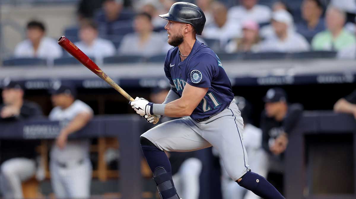 Seattle Mariners third baseman Miles Mastrobuoni (21) follows through on an RBI single against the New York Yankees during the fourth inning at Yankee Stadium.