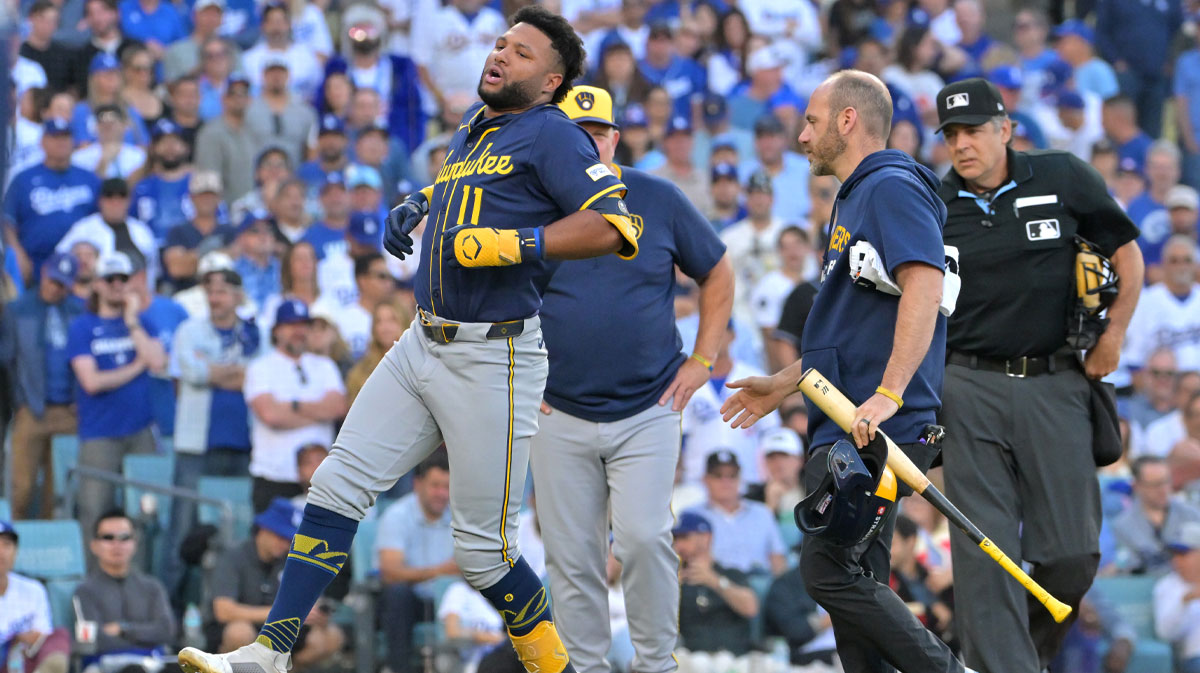 Milwaukee Brewers center fielder Jackson Chourio (11) reacts after an apparent injury in the seventh inning against the Los Angeles Dodgers during game three of the NLCS round for the 2025 MLB playoffs at Dodger Stadium.