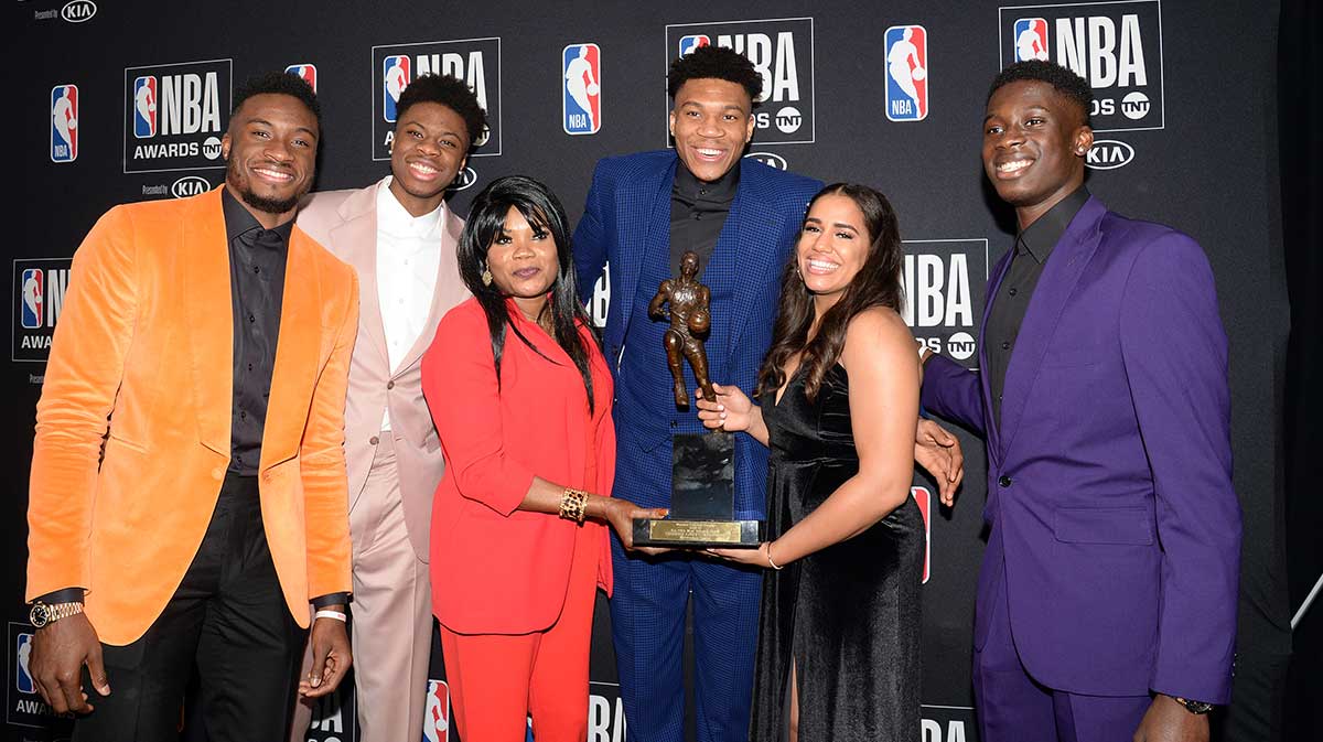 Milwaukee Bucks forward Giannis Antetokounmpo poses with his family following his award of the NBA most valuable player at the 2019 NBA Awards show at Barker Hanger.