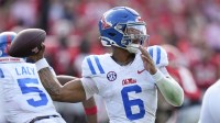 Mississippi Rebels quarterback Trinidad Chambliss (6) passes against the Georgia Bulldogs during the first half of the game at Sanford Stadium.
