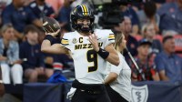Missouri Tigers quarterback Beau Pribula (9) warms up before the game against the Auburn Tigers at Jordan-Hare Stadium.