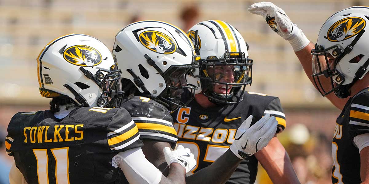 Missouri Tigers running back Marquise Davis (7) celebrates with team mates after scoring against the Louisiana-Lafayette Ragin Cajuns during the second half of the game at Faurot Field at Memorial Stadium.