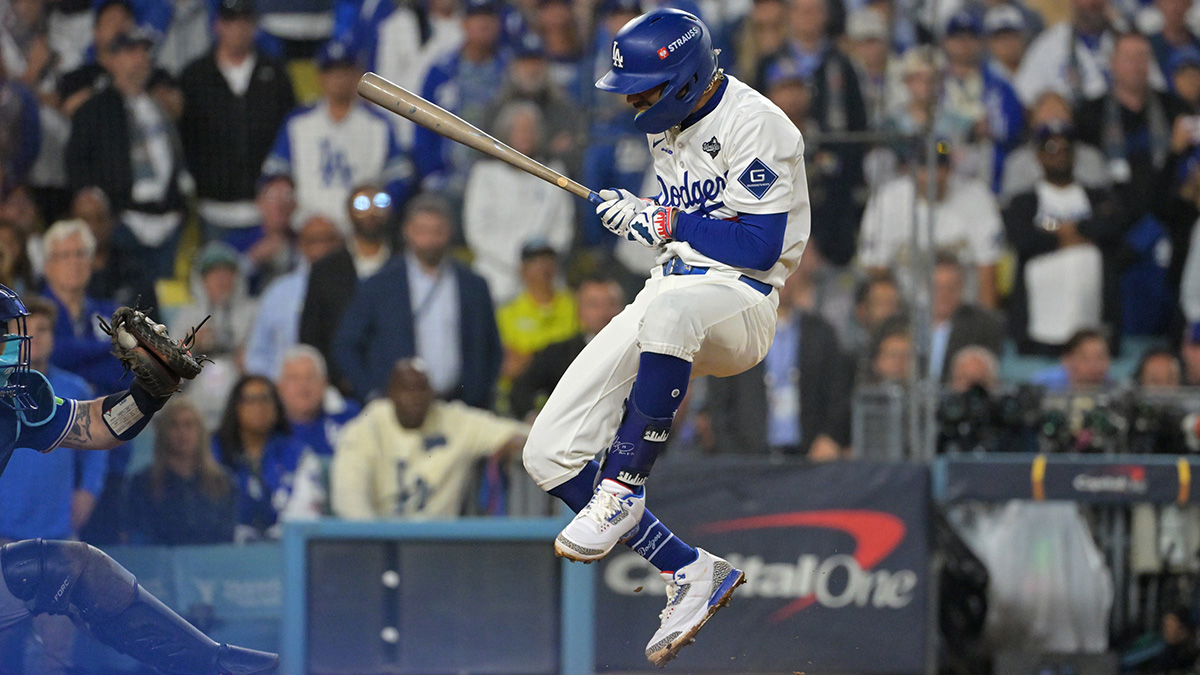 Los Angeles Dodgers shortstop Mookie Betts (50) avoids a pitch in the fifteenth inning against the Toronto Blue Jays during game three of the 2025 MLB World Series at Dodger Stadium.